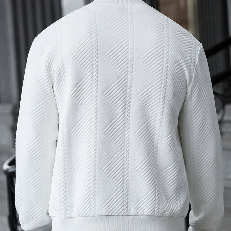 White textured coat back view with quilted rib pattern and ribbed hem
