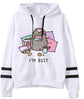 White fleece hoodie with busy cat artwork and text; black drawstrings