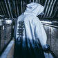 Gradient hoodie with hood and kangaroo pocket, large back graphic text and numbers.