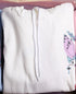 Prayer hands hoodie close-up with drawstring hood, front pocket, printed graphic on sleeve
