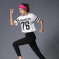 Pink Bluetooth fitness headband worn by model during activity