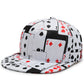 White baseball cap with repeating playing-card print, red and black suit symbols