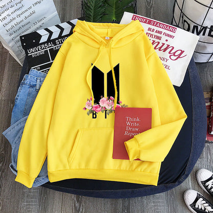 Yellow youth hoodie with heart-flower garland graphic, hood drawstrings and kangaroo pocket