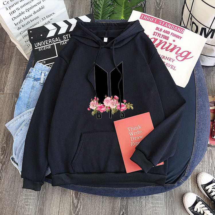 Black youth hoodie with heart-flower garland graphic, drawstring hood and front pocket