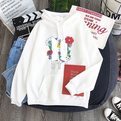 White youth hoodie with colorful heart-flower garland graphic and front kangaroo pocket
