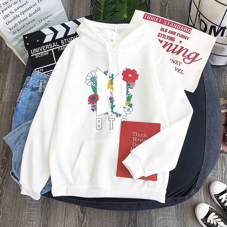 White youth hoodie with colorful heart-flower garland graphic and front kangaroo pocket