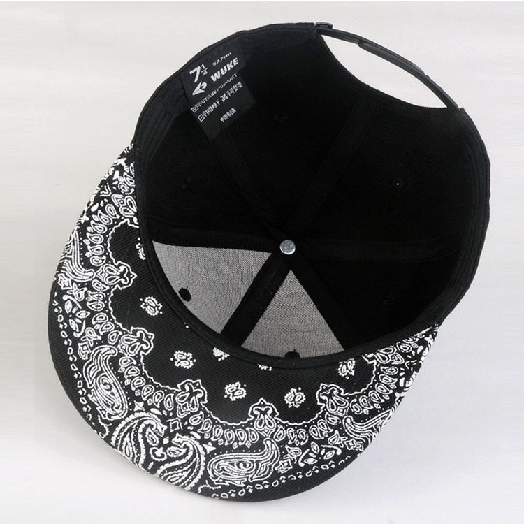 Black baseball cap with paisley brim; interior mesh panel and button
