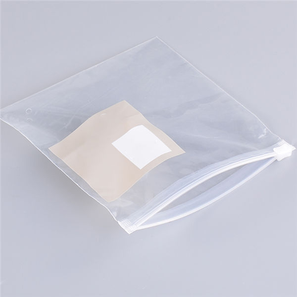 Clear plastic headband storage pouch with label and drawstring