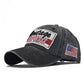 Dark baseball cap with embroidered USA flag patch and front graphic badge, curved brim
