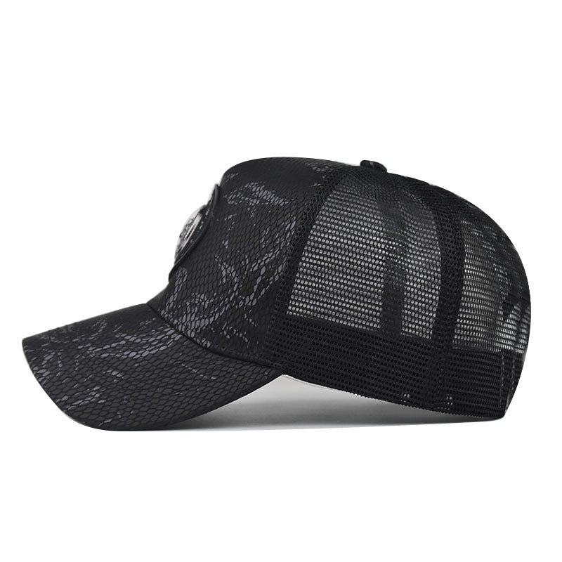 Baseball cap in black with textured pattern, mesh side panels, curved brim