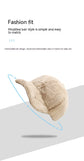 Plush fleece baseball cap with rabbit-fur look, light khaki, curved brim, angled view