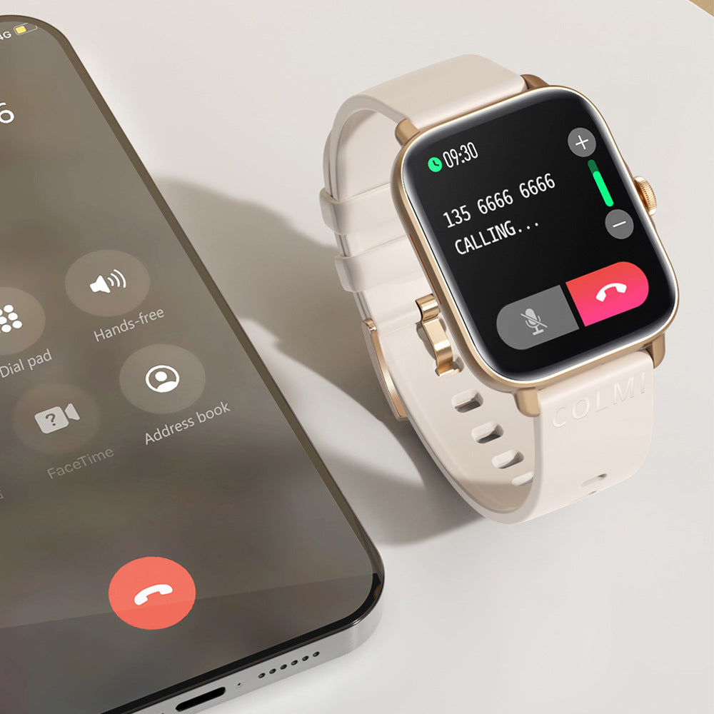 Waterproof smartwatch with white strap, gold case, call interface on full display