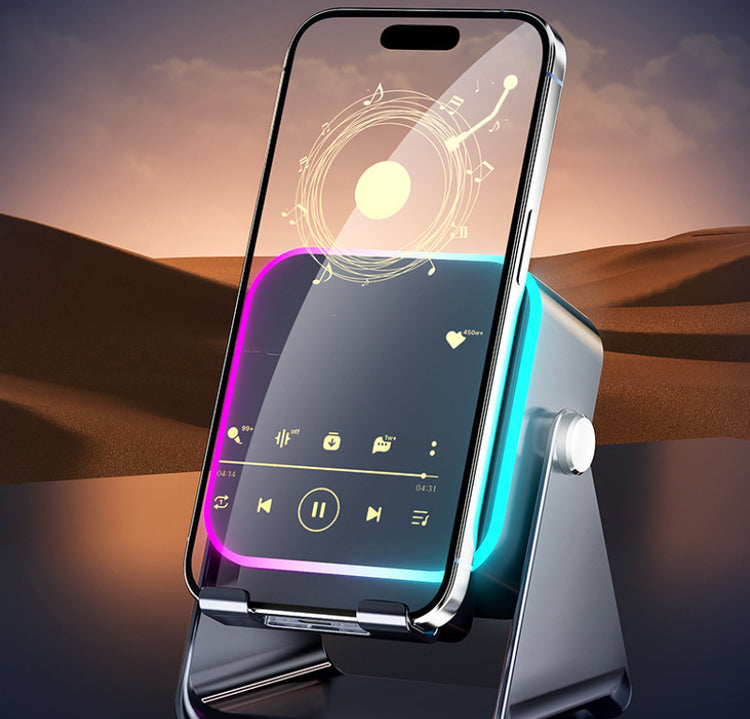 Black phone stand speaker holding a smartphone with RGB ambient light