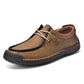 Tan brown lace-up casual shoes with cream laces, black side trim, stitched upper.