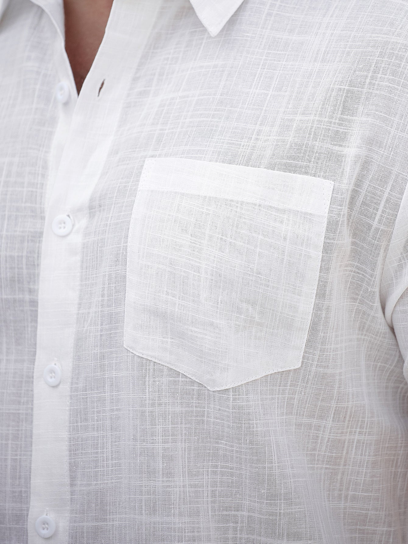 White cotton short-sleeve shirt chest pocket with button placket detail