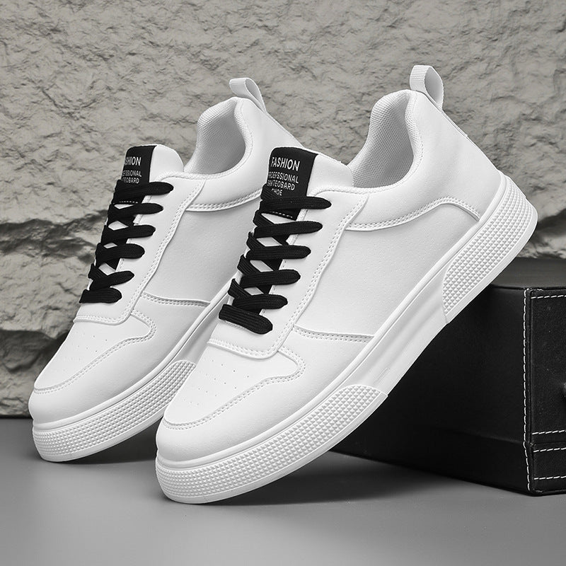 White sneakers with black lace-up details and textured white sole