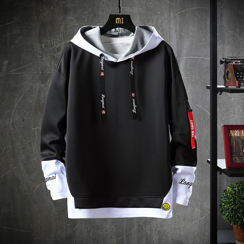 Black hoodie sweater with hood, black drawstrings, kangaroo pocket, contrast inner cuffs