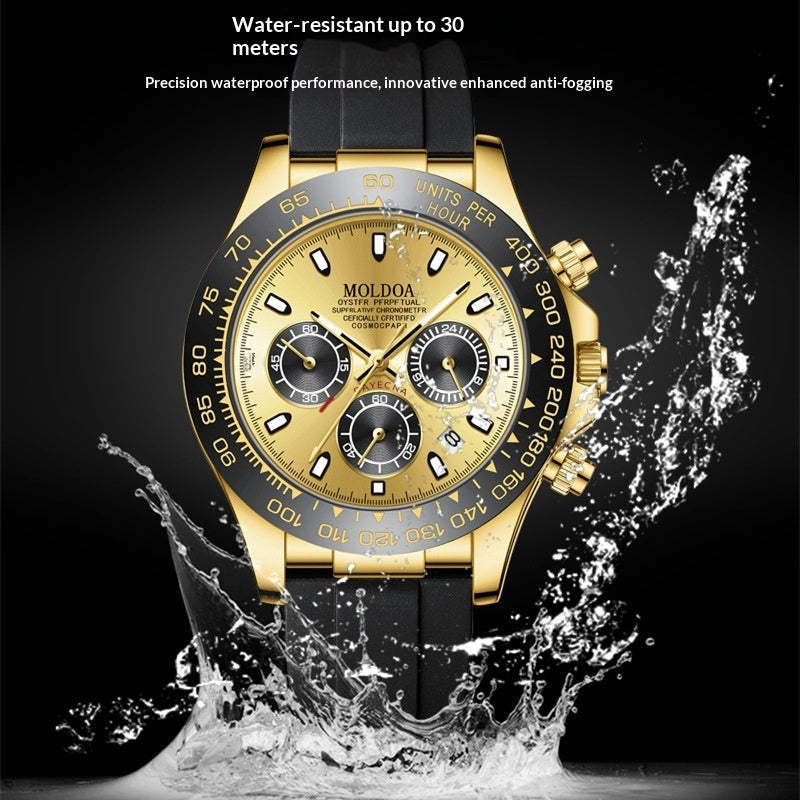Gold-tone mechanical-style men’s watch with black dial and black rubber strap