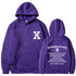Loose hoodie in purple with hood, front pouch pocket, and chest/back graphic print.
