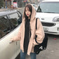 Apricot zip-up hoodie jacket with hood, long sleeves, and front zipper opening.