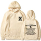 Loose hoodie in cream with hood, front pouch pocket, and chest/back graphic print.
