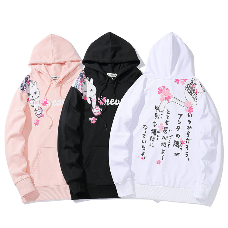Cat print hoodie set in pink, black, and white, with hood and front pocket.