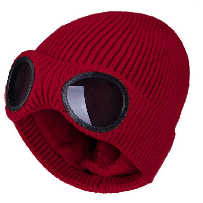 Red knit beanie with windproof goggle inserts and faux-fur ear covers