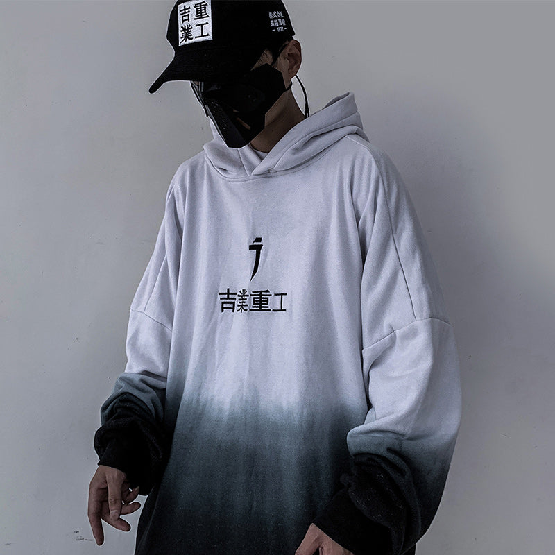 Gradient hoodie with hood and kangaroo pocket, front chest graphic print.