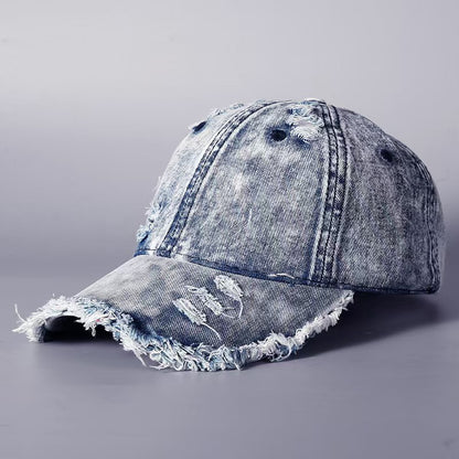 Washed denim baseball cap with frayed brim and distressed side panel, light wash denim.