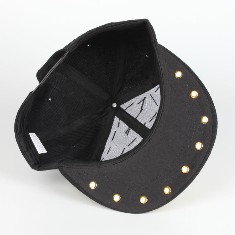 Black baseball cap interior with mesh back panel and gold button rivets