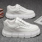 Off-white lace-up chunky-sole sneakers with perforated toe and stitched side panels