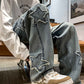 Light blue wide-leg denim pants with star appliques on side panels