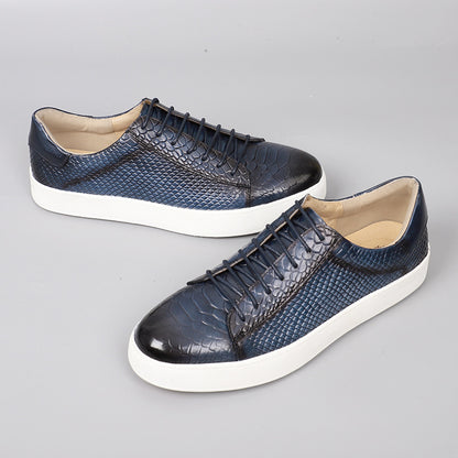 Lace-up embossed leather casual shoes in sapphire blue with white rubber sole