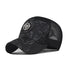 Baseball cap in black with red speckled pattern, mesh side panels, round logo badge