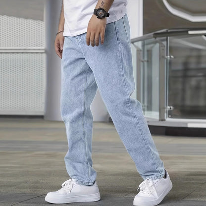 Light blue slim jeans with straight-to-tapered silhouette and belt loops