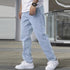 Light blue slim jeans with straight-to-tapered silhouette and belt loops