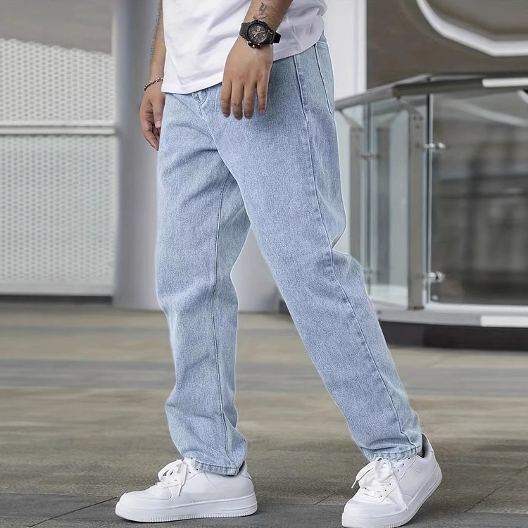 Light blue slim jeans with straight-to-tapered silhouette and belt loops