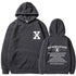 Loose hoodie in dark gray with hood, front pouch pocket, and chest/back graphic print.