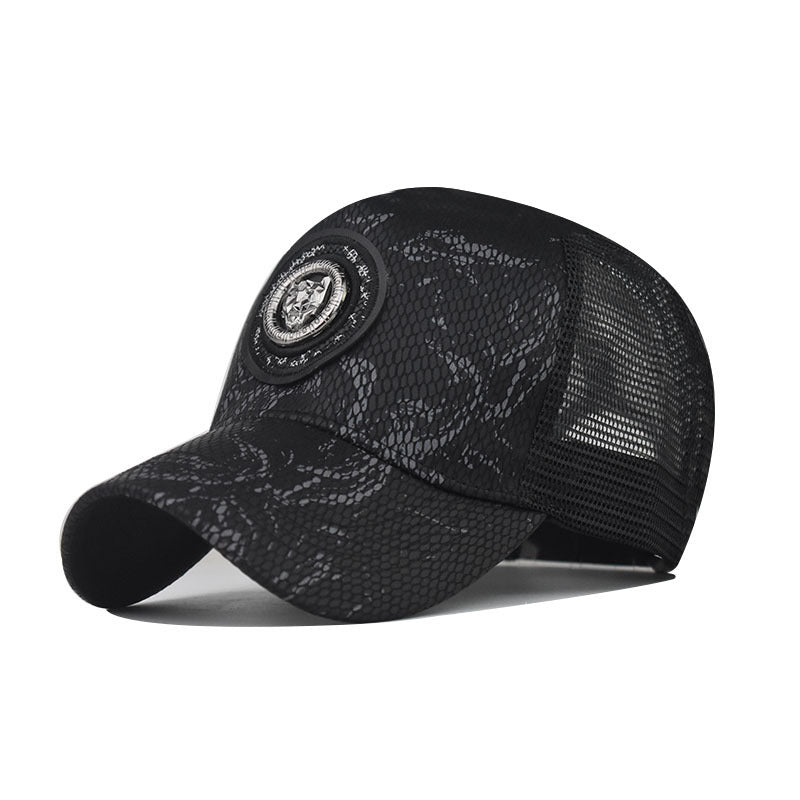 Baseball cap in black with textured animal print, mesh side panel, round logo patch