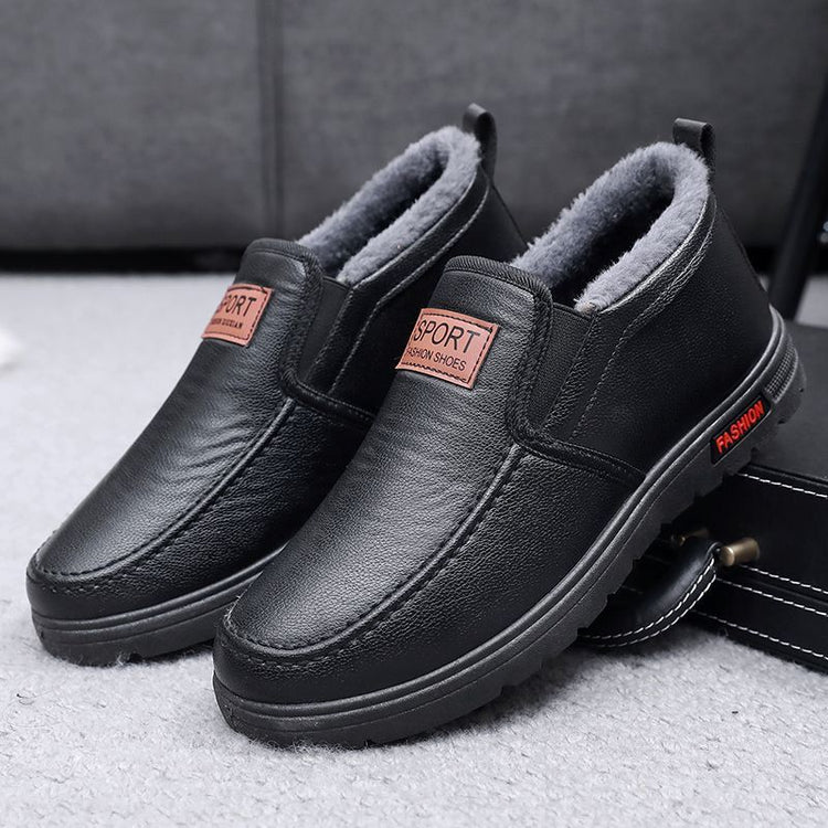 Fleece-lined waterproof slip-on shoes, black leather pair with raised sidewall sole