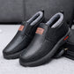 Fleece-lined waterproof slip-on shoes, black leather pair with raised sidewall sole