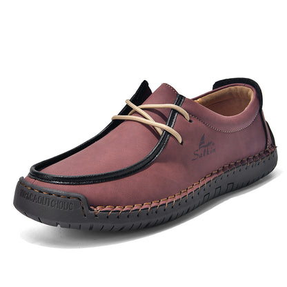Burgundy lace-up casual shoes with cream laces and black trim, stitched upper.