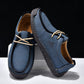 Dark blue lace-up casual shoes with cream laces, stitched moccasin-style upper.