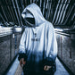 Gradient hoodie with hood and kangaroo pocket, white-to-dark chest graphic print.