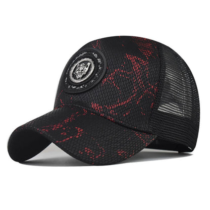 Baseball cap in black with red speckled pattern and round logo patch, curved brim