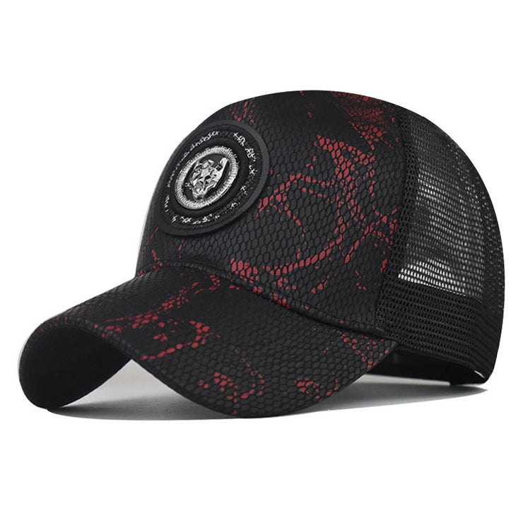 Baseball cap in black with red speckled pattern and round logo patch, curved brim