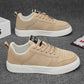 Khaki beige sneakers with white sole and lace-up closure