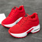 Red knit mesh lace-up sneakers with white platform sole and air-cushion detail