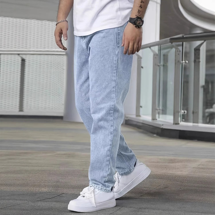 Light blue slim jeans showing side seam and tapered fit at ankle