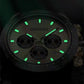 Mechanical-style men’s watch with dark dial and green luminescent hands